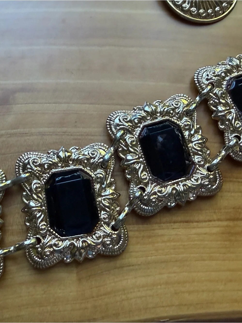 Gold-Tone Statement Waist Belt with Black Gem Accents